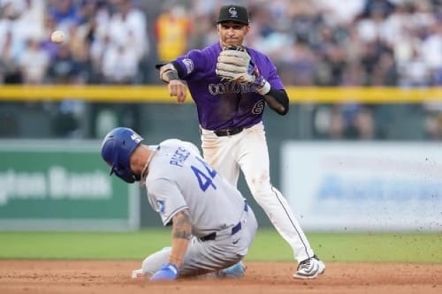 Ryan Ritter touches second and turns to throw to first for a double play.