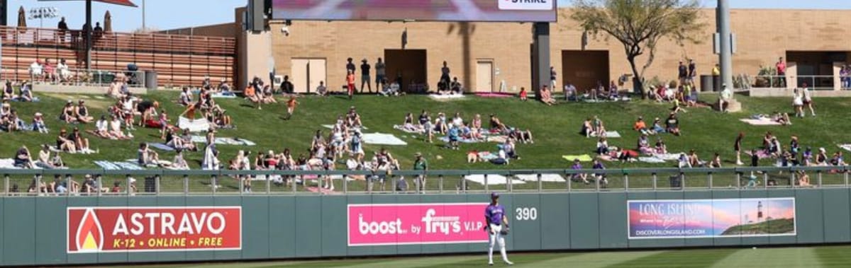 A Rockies outfielder stands in left field.