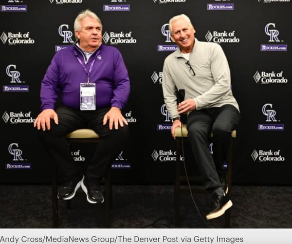 Bill Schmidt and Bud Black address the media at RockiesFest. Both look relaxed. The photo was taken by Andy Cross. 